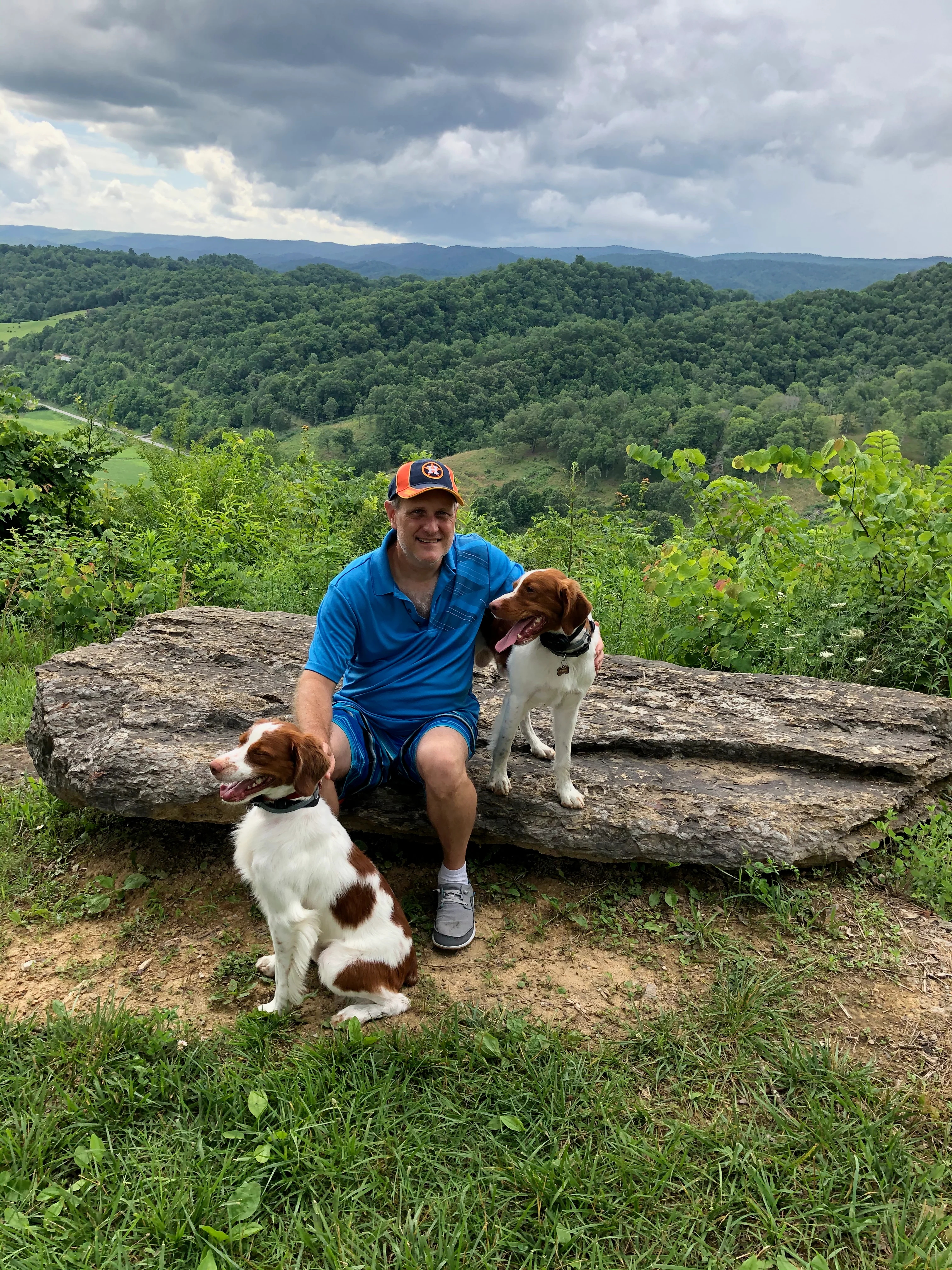 Dan with Sundance and Cassidy on a mountaintop.